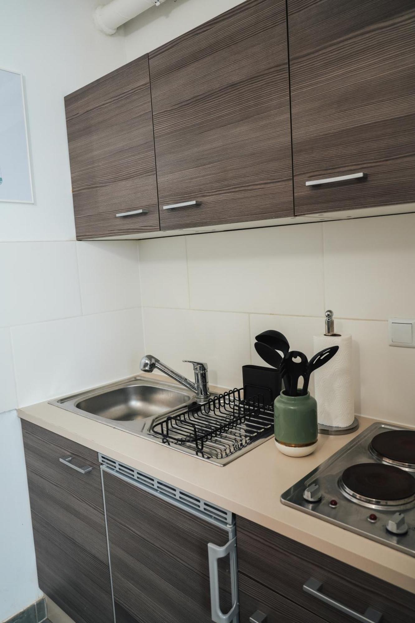 Apartment Global Living - Design I I Beamer I Kitchen I Terrace I